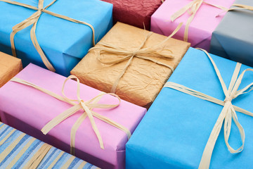 wrapped colorful gift boxes with bows