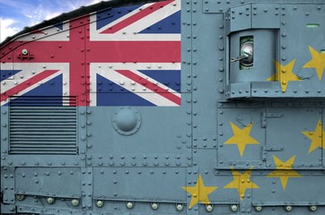 Tuvalu flag depicted on side part of military armored tank closeup. Army forces conceptual...