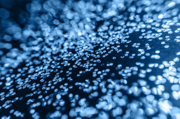 Glittered background toned in classic blue color. Trendy color 2020 year. Horizontal wallpaper...