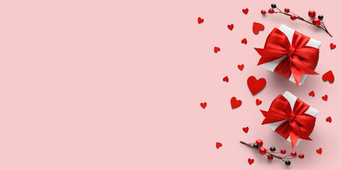 Valentine's day gifts with red bows and hearts.