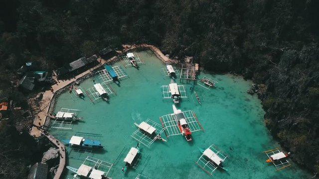 cramped Banca boats on a small island port in the Philippines