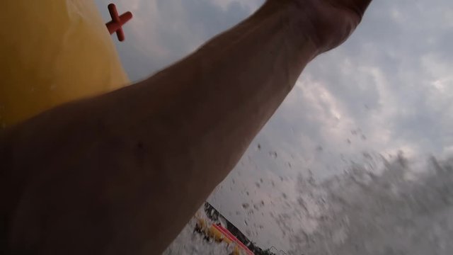 GoPro Slowmotion of Male Going off Balloon Waterslide in Asian Waterpark
