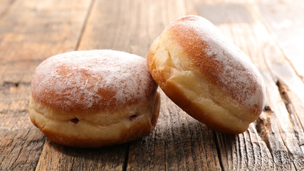 gourmet donut on wood background