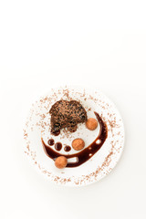 chocolate dessert with marzipan cakes on a white background