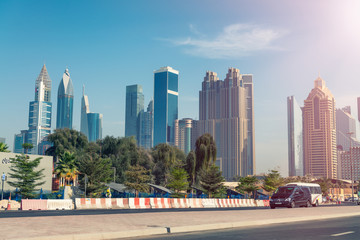Fototapeta na wymiar DUBAI, UAE - DECEMBER 4, 2016: Dubai skyline as seen from the street