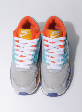 london, englabnd, 05/08/2018 Nike Air Max 90 Grey Clearwater Gold LIMITED EDITION. Nike air max retro classic sneaker trainers. Nike sport and street wear fashionable athletic apparel. Isolated nikes.