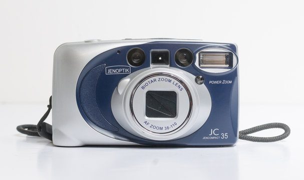 london, england, 05/05/2018 A Retro vintage jenoptik jc 35 35mm film camera isolated on a white background. vintage hipster style camera making a fashionable come back in youth culture.