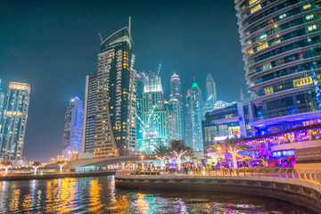 DUBAI, UAE - DECEMBER 5, 2016: Dubai Marina skyline at nightalong the canal, UAE