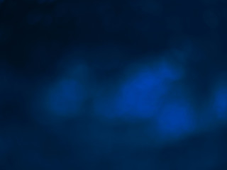 blue glitter sparkle isolated on black background. color 2020