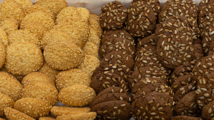 homemade cookies with sunflower seeds. Dark and white dough baking, backdrop food background. Sweet high-calorie dessert cookies