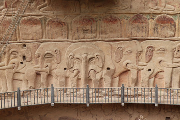 La Shao temple with giant 30-meter Buddha carved into rock at water Curtain Caves in Wushan , Gansu province, China. 