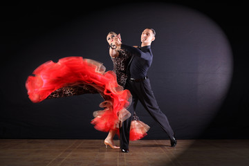 dancers in ballroom isolated on black background
