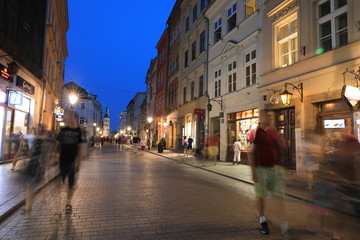 Fototapeta na wymiar KRAKOW - JUN 15:Classic street nigjt life in Krakow 15 June 2019, Poland. Krakow is one of the most populated metropolitanareas in Europe
