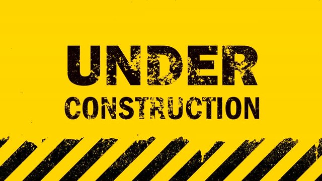 Yellow background with under construction sign