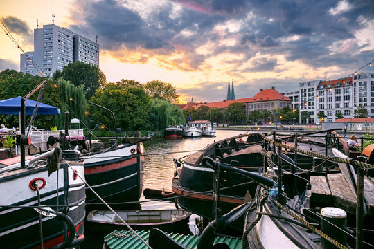Historic harbor during dramatic sunset  in Berlin, Germany