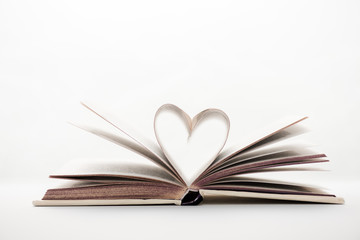 book with heart-shaped pages on white with copy space