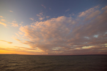 Fototapeta na wymiar Sunset landscape on the beach at the sea