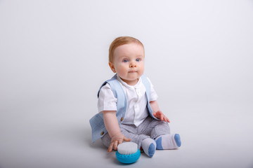 toddler with toy isolated on white background