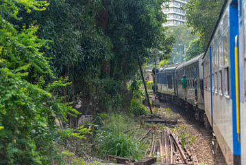 Obraz premium Images from the Interior of the second category train car in Sri Lanka from Colombo to Matara. Colombo, Sri Lanka.