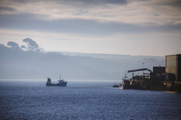 A trawler puts in to the harbour in Fishing village Appledore,North Devon,