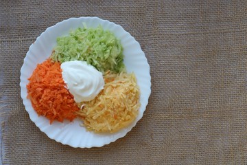 Closeup image of vegetables festive three colors group. Red carrot, green radish and yellow turnip...