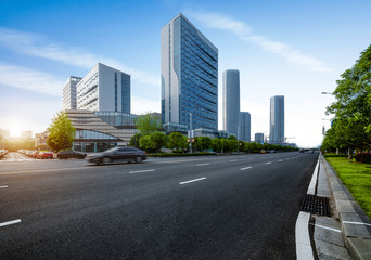 Road and tall buildings on both sides, urban landscape of Chongqing, China.