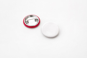 Red and white pins front and back