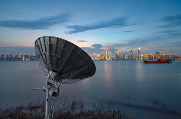 Satellite antenna in the tall buildings of the city