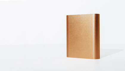 Portable power bank for charging mobile devices, battery bank isolated on white background