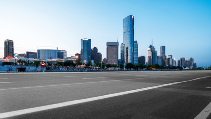Fototapeta na wymiar Expressway in front of the city skyline, Nanchang, China.