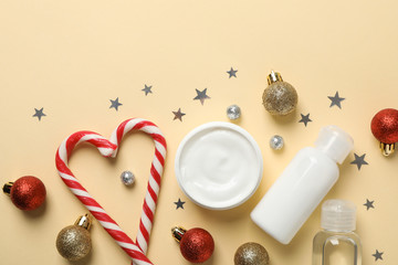 Set of cosmetics, jar of winter cream for skin on yellow background, space for text. Top view