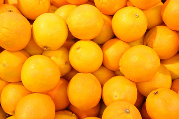 background of a bunch of juicy orange oranges