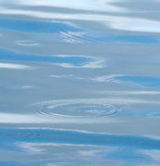 Fototapeta na wymiar Close up of sea wave. Soft focus of ocean surface water. Reflection of sky in water. Abstract background and copy space.