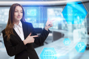 Business, Technology, Internet and network concept. Young businessman working on a virtual screen of the future and sees the inscription: Risk management