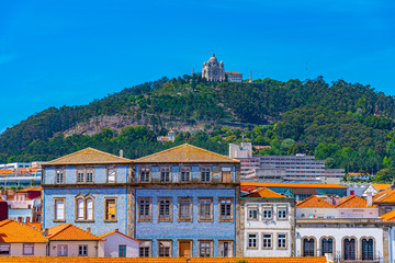 Colorful facades of houses on Lima riverside in Viana do Castelo in Portugal