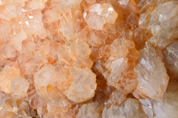 Beautiful gemstone Artichoke quartz and its texture, transparent, with an orange tint.