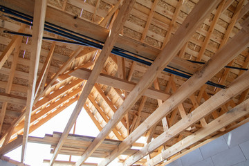 Wooden roof at a cottage construction site
