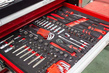 The set of hand tools for to repair. Many wrench and tools close-up in box for to repair the car or...