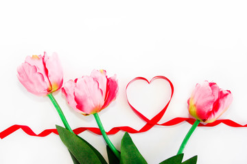 natural pink tulips and red ribbon heart