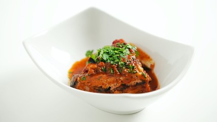 Eggplant with ground beef in tomato sauce in the oven