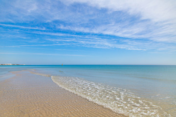 Fototapeta na wymiar Beautiful sea landscape. Blue sea water and clear peaceful sky. Horizontal color photography.
