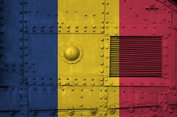 Chad flag depicted on side part of military armored tank closeup. Army forces conceptual background