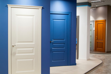 concept of the unknown hidden behind doors, when given a choice at the fork of life. example of interior doors at the exhibition store