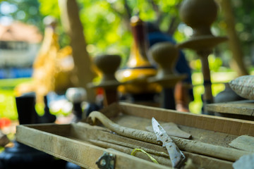Clay potter creating on the pottery wheel. Sculptor from fresh wet clay on pottery wheel. Selected focus. potter was produced on range of pot in open air