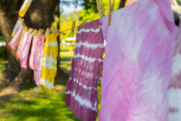 Colorful Abstract tie dyed fabric  hung up to dry.