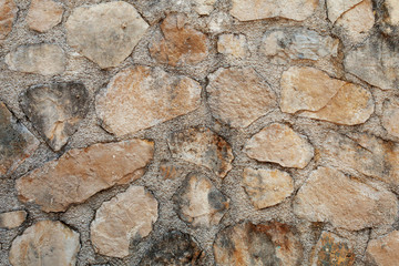 background of an old stone wall in Perast, Montenegro