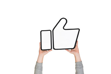 Hands holding the sign of like on white studio background. Negative space to insert your text or...