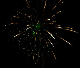 Fireworks sparkles in the night sky as background