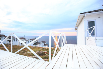 White wooden house by the sea for relaxation. Hotel.