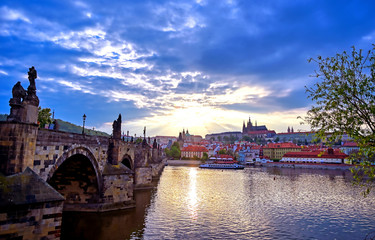 A view of Prague Castle and the Charles Bridge across the Vltava River in Prague, Czech Republic.